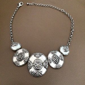 Chico’s heavy massive necklace.